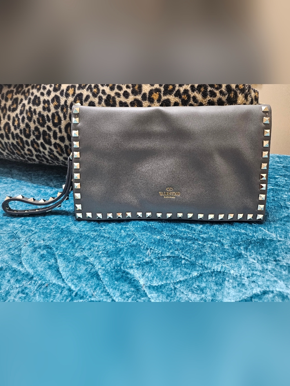 Valentino Garavani Rockstud clutch bag. 